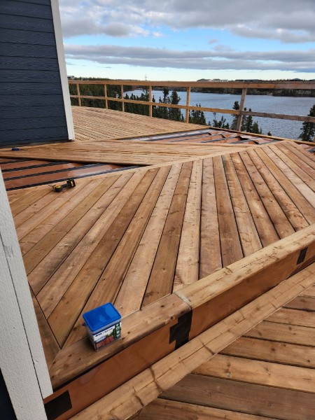 Detailed custom deck overlooking the water